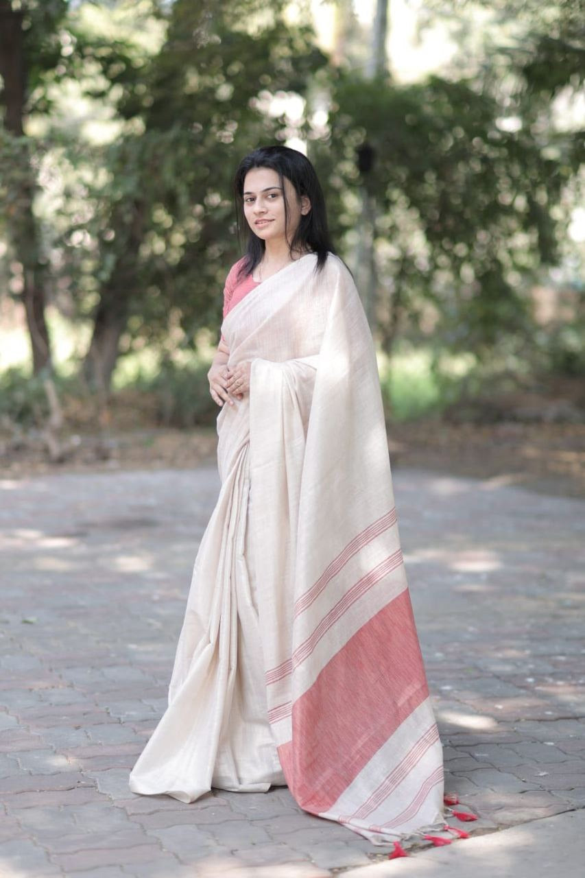 Off white with Pink accents striped Pallu mysore silk fabric  with tassels  