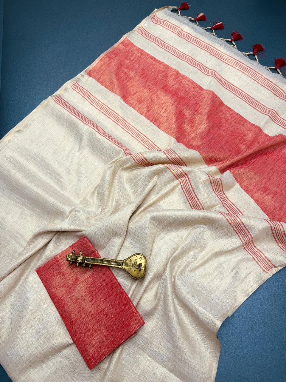 Off white with red accents striped Pallu mysore silk fabric  with tassels  