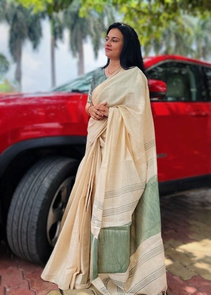 Off white with green accents striped Pallu mysore silk fabric  with tassels  