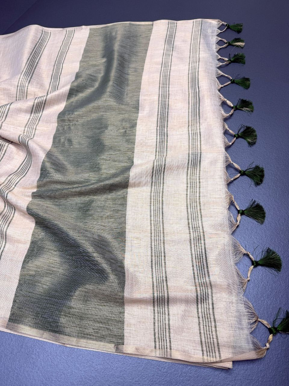 Off white with grey accents striped Pallu mysore silk fabric  with tassels  