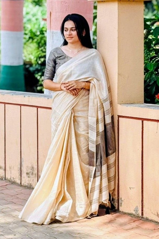 Off white with grey accents striped Pallu mysore silk fabric  with tassels  