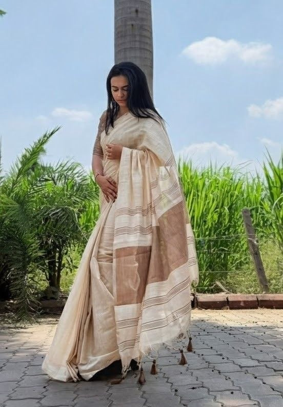 Off white with beige accents striped Pallu mysore silk fabric  with tassels  