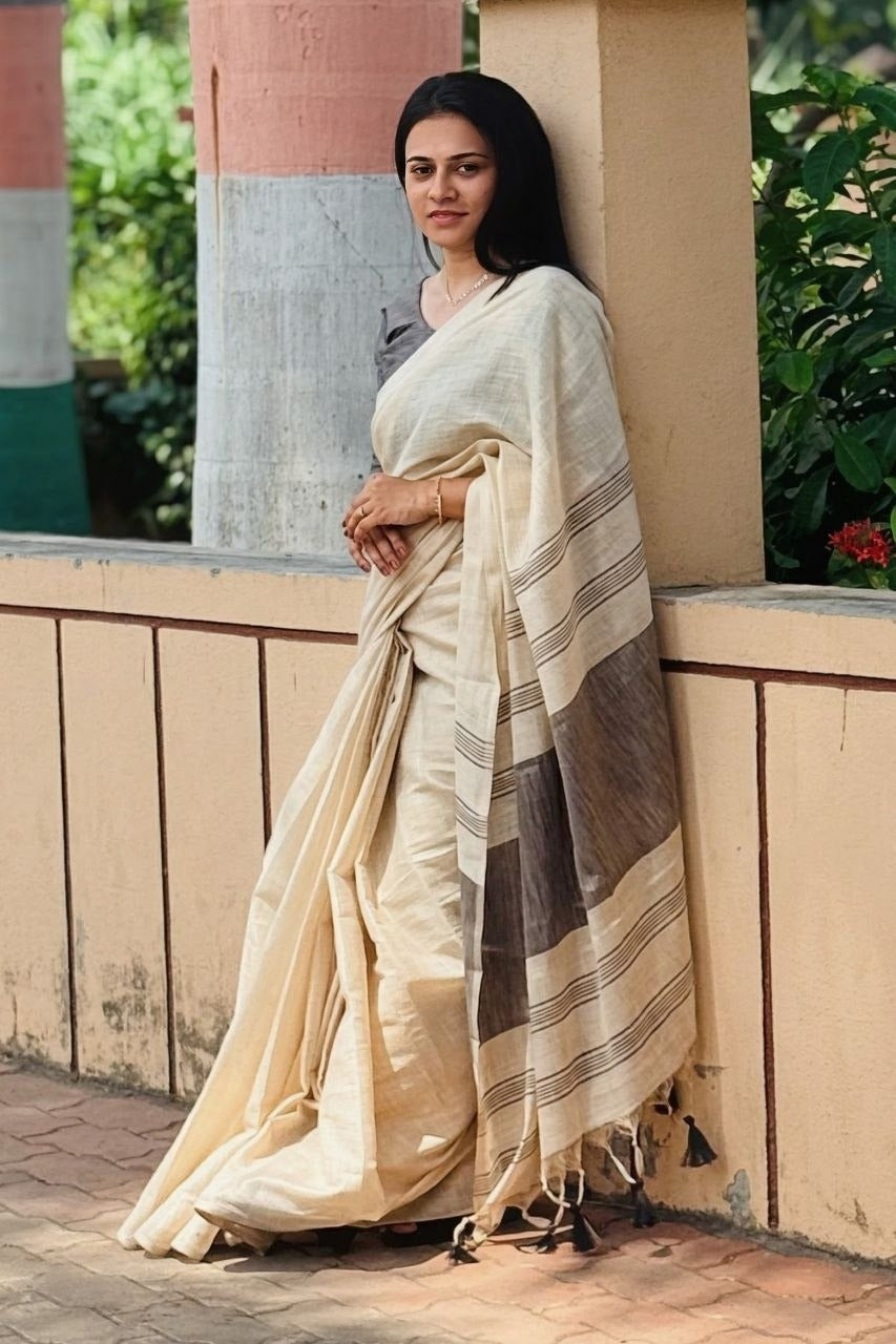 Off white with grey accents striped Pallu mysore silk fabric  with tassels  